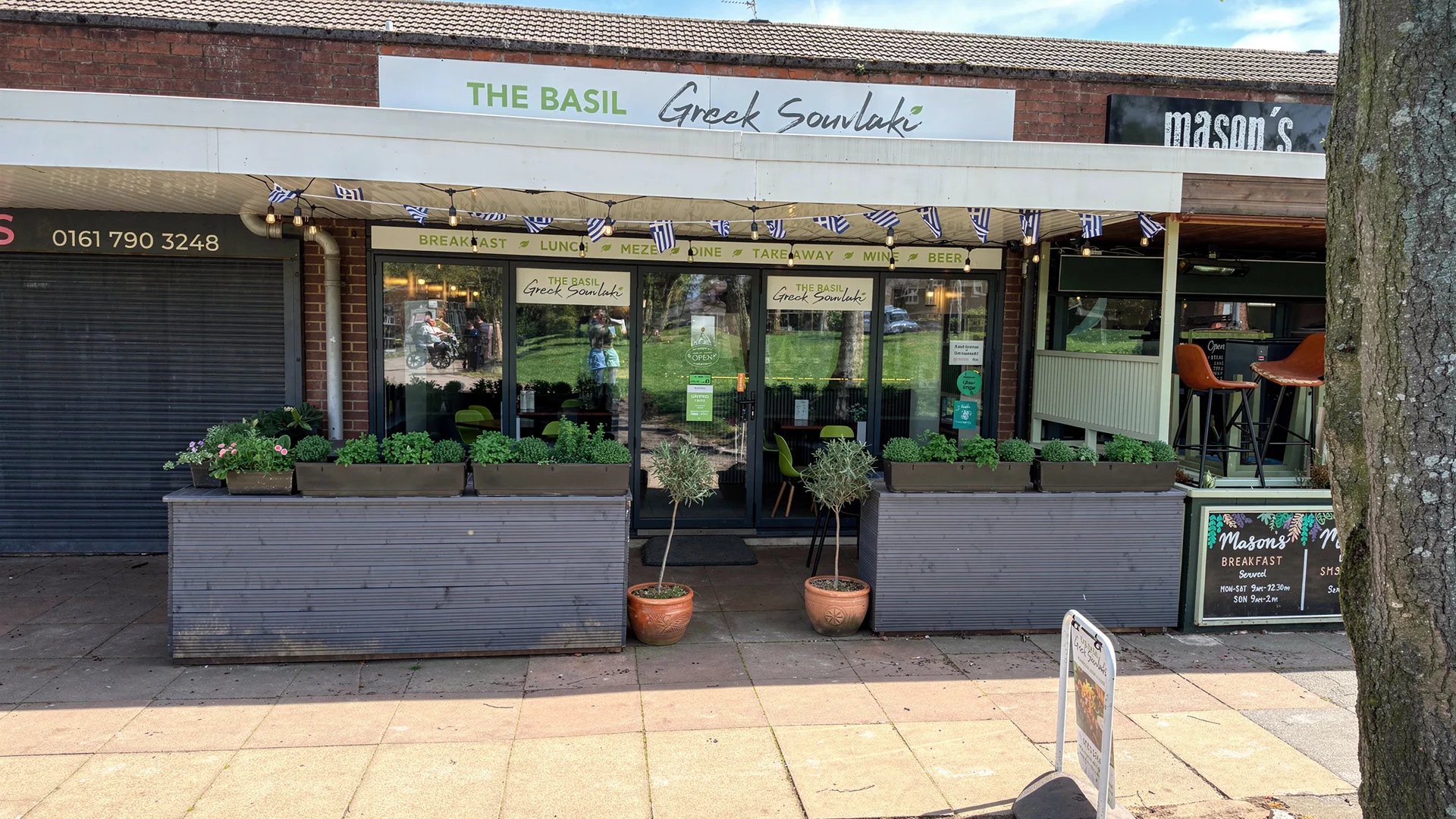The Basil Greek Souvlaki shopfront at Standfield Centre, Boothstown